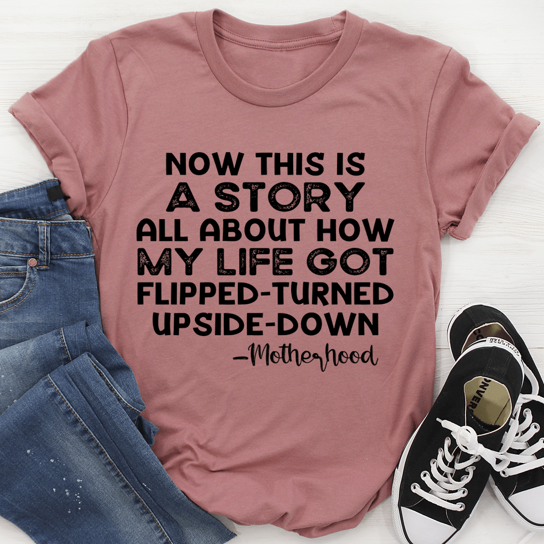 Rose mauve crewneck T-shirt with bold black 'Motherhood' slogan across chest
