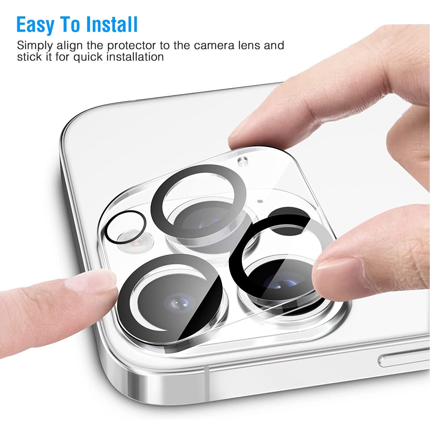 Hands installing tempered glass camera lens protector on phone camera lenses