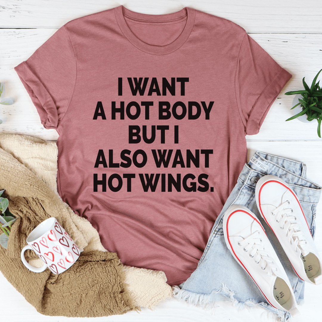 Mauve crewneck T-shirt with bold black text: “I WANT A HOT BODY… HOT WINGS.”