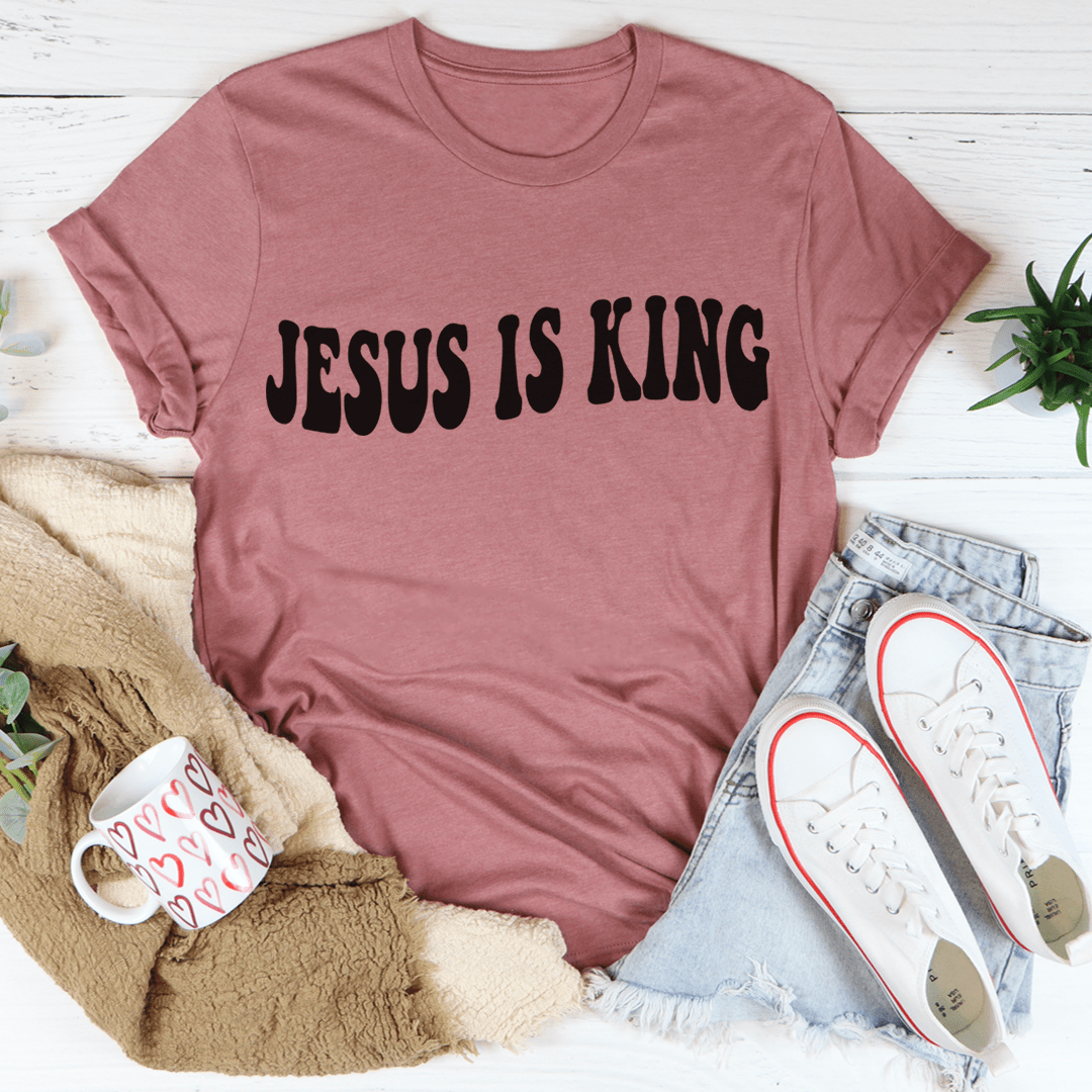 Mauve short-sleeve T-shirt with black "JESUS IS KING" front graphic.