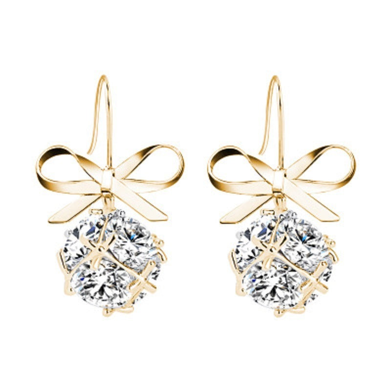 Gold-tone bow hook earrings with ribbon bows and round zircon drop stones