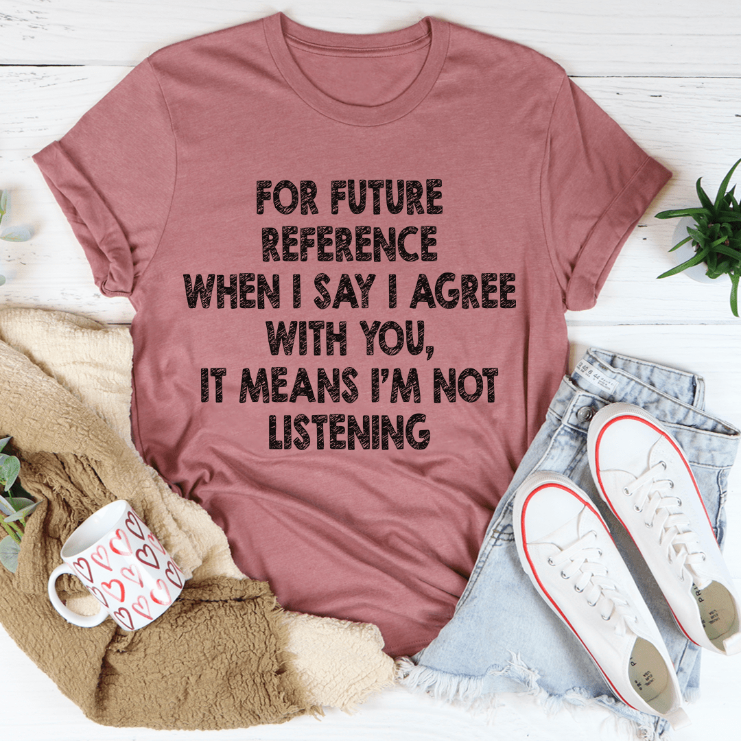 Dusty rose crew-neck T-shirt with quote graphic: 'I'm not listening'.
