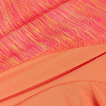 Orange-red heather performance fabric close-up with seam and inner layer panel