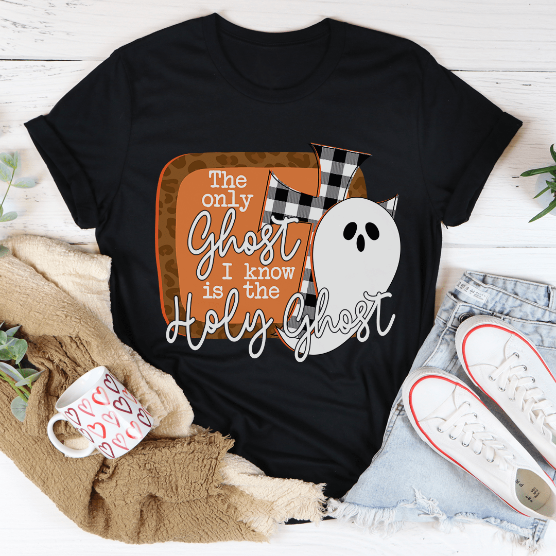 Black T-shirt with cartoon ghost face and “The only ghost” text graphic on front.