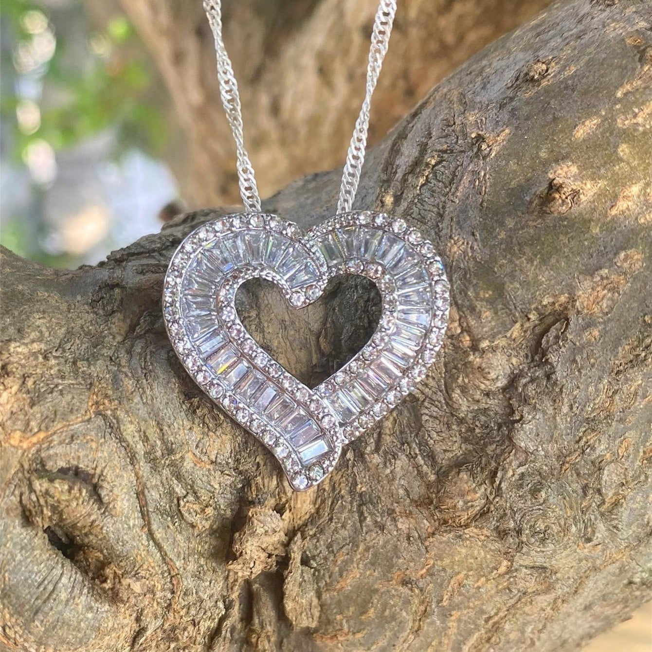 Heart pendant necklace with silver-tone faux diamond heart pendant on chain