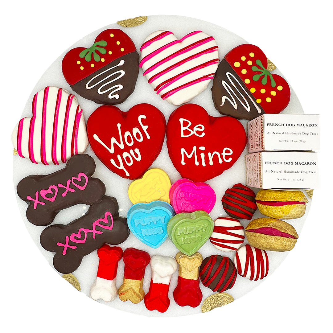 Valentine dog treat gift box with red heart, striped and chocolate cookies.