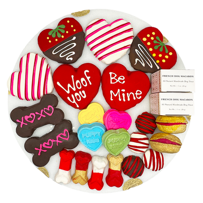 Valentine dog treat gift box with red heart, striped and chocolate cookies.