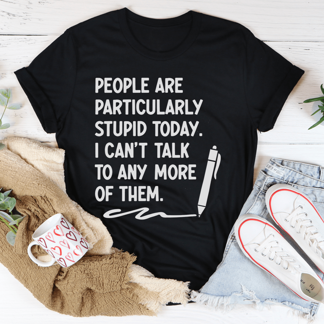 Black crew-neck T-shirt with quote text and standing-pen icon.
