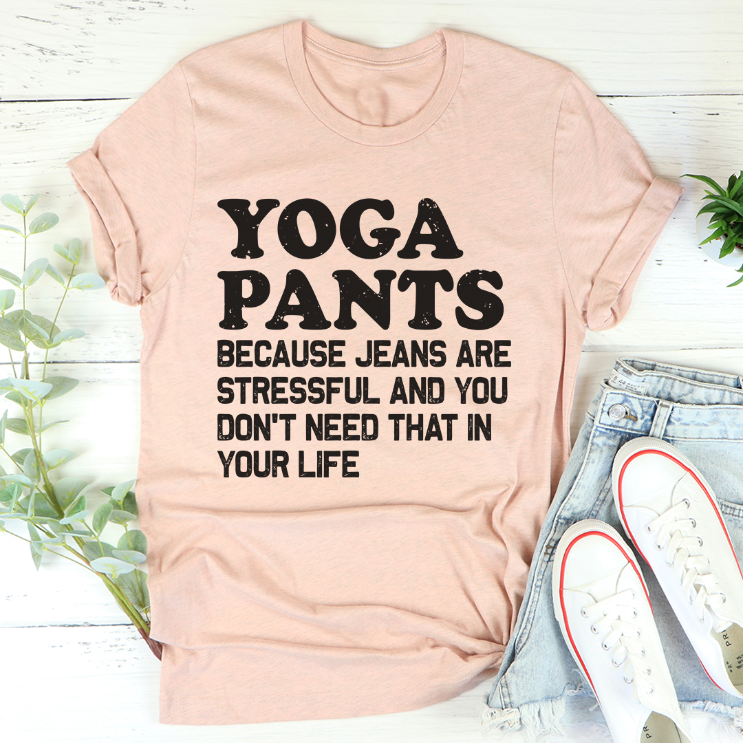 Peach graphic T-shirt with large “YOGA PANTS” lettering and slogan on front