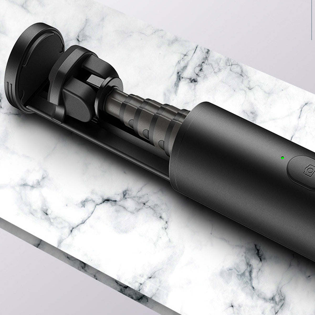 Black extendable mini selfie stick with locking segments.