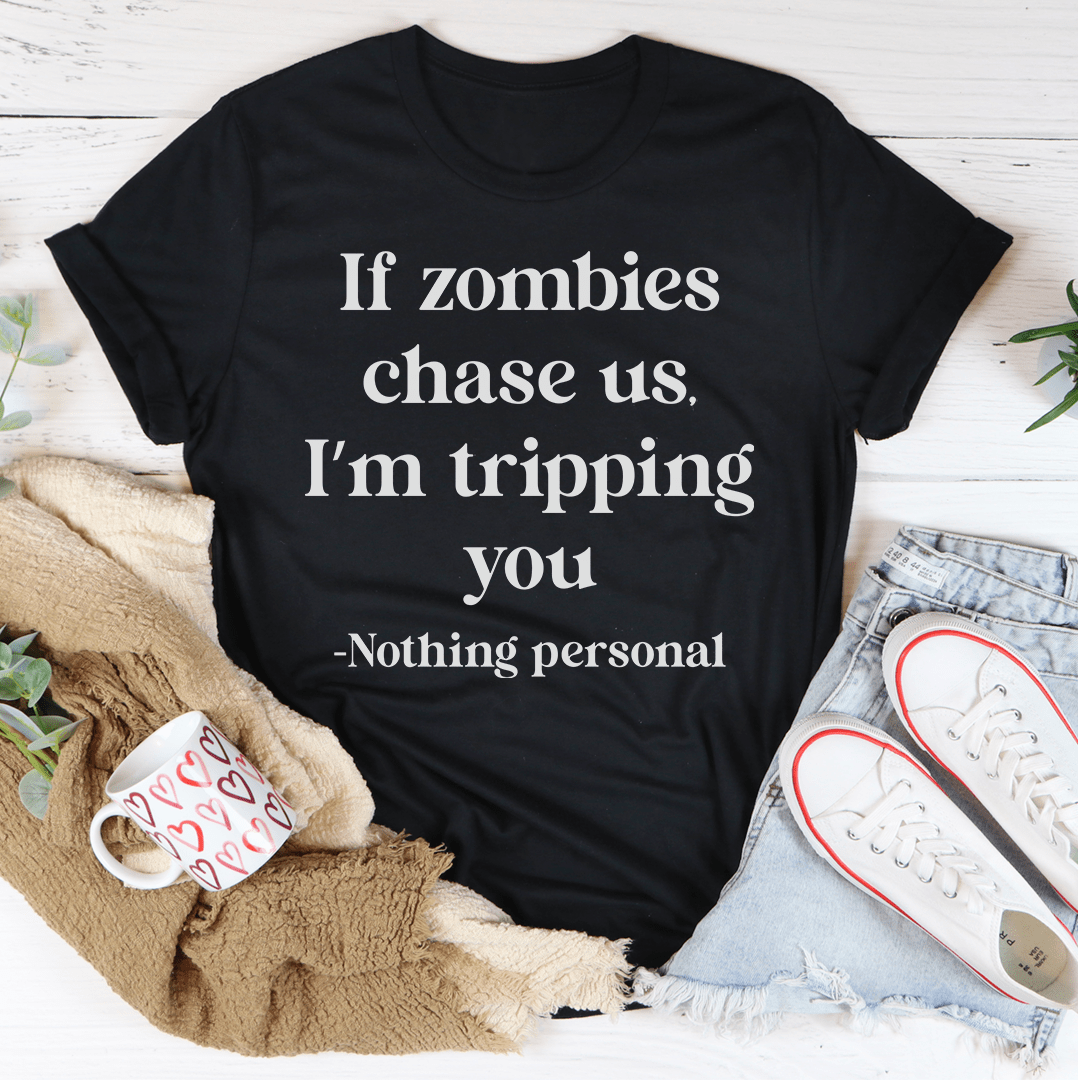 Black crewneck short-sleeve T-shirt with centered quote text: "If zombies chase us..."