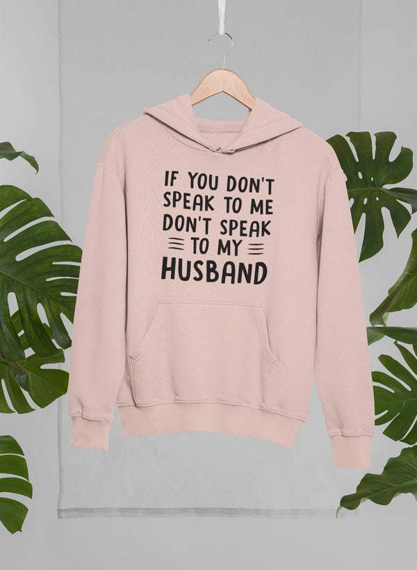 Pink hoodie with centered quote graphic in white, front pocket, and drawstring hood