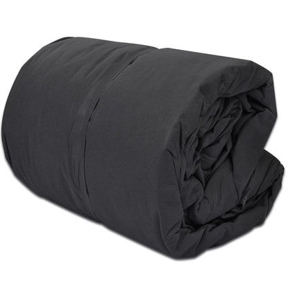 Gray caravan cover folded bundle with layered fabric