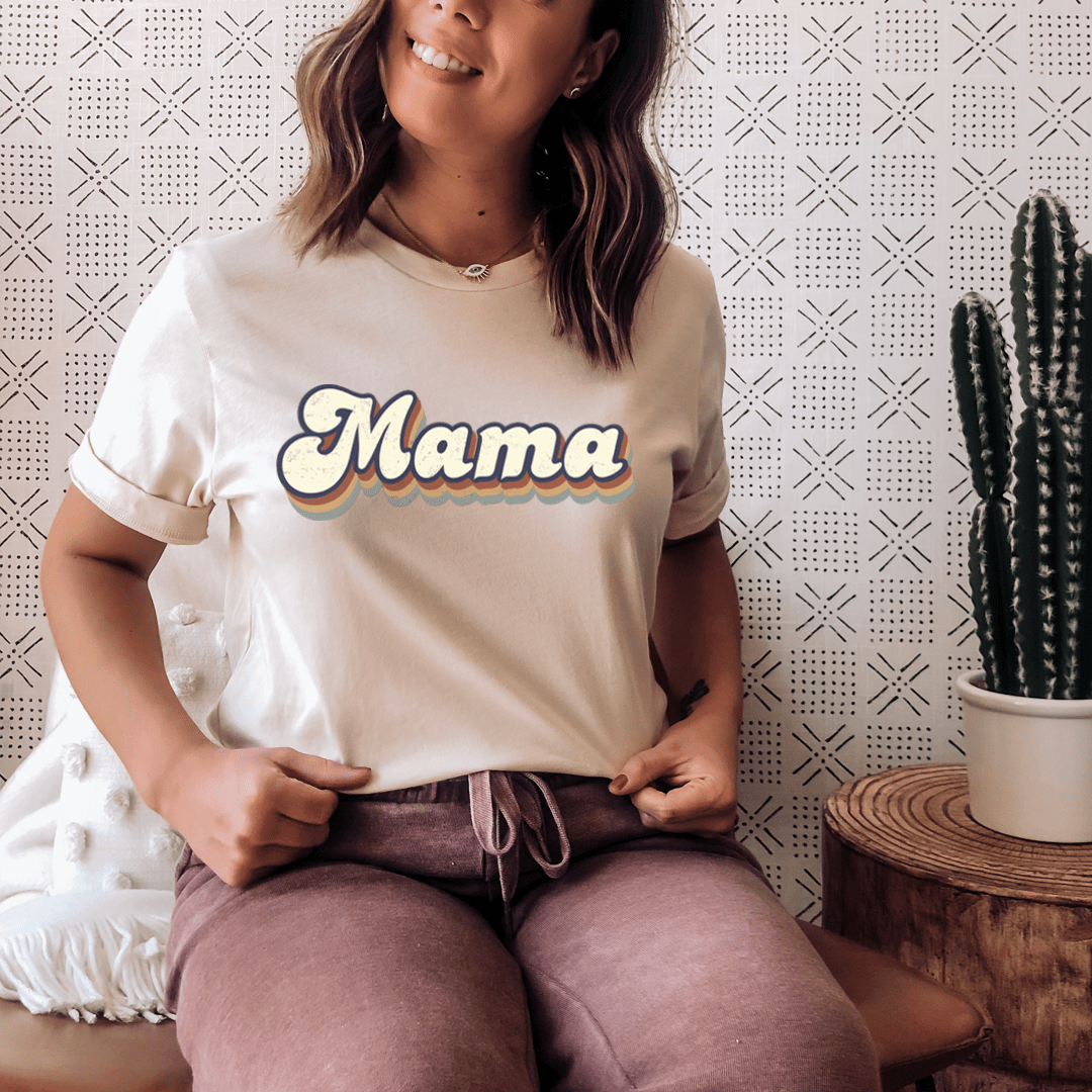 White Mama retro T-shirt with colorful “Mama” graphic on the front