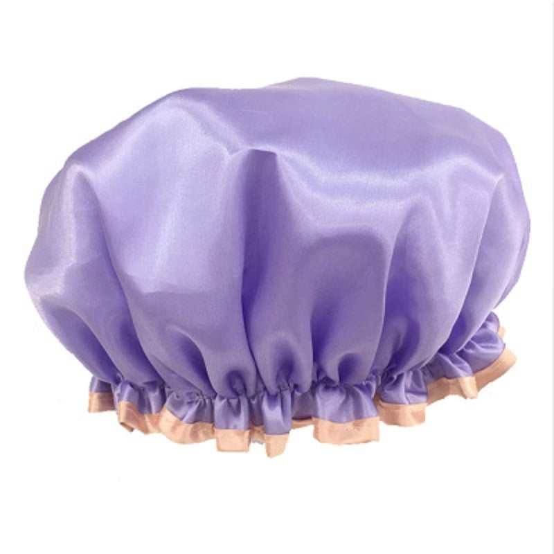 Purple satin shower cap with elastic ruffle edge