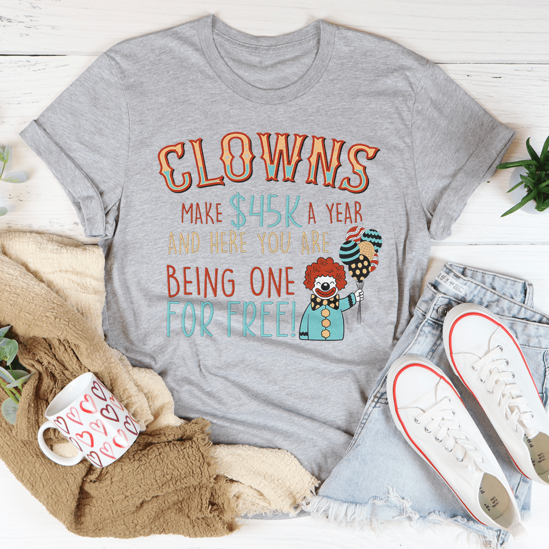 Heather gray crew-neck T-shirt featuring CLOWNS slogan and colorful clown character graphic