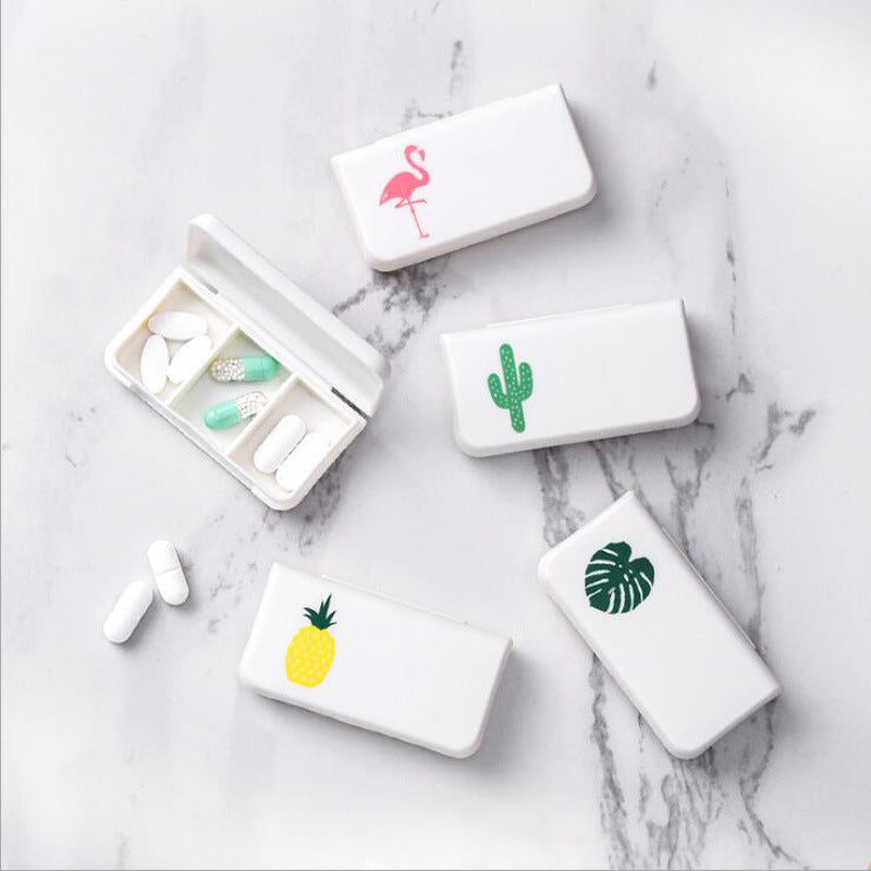 White 3-compartment pill organizer cases with themed icons on lids, compartments open
