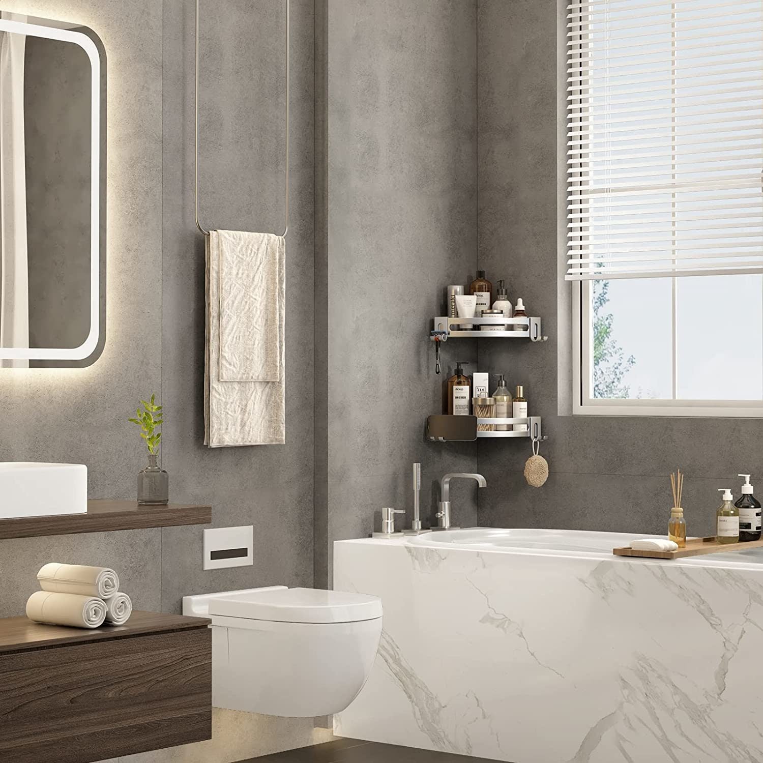 Silver corner shower shelf caddy with two curved tiers for toiletries