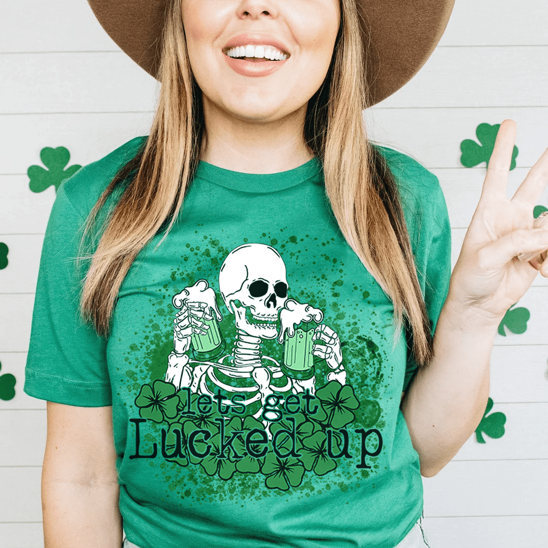 Green crew-neck T-shirt with green skull graphic and shamrock clover design