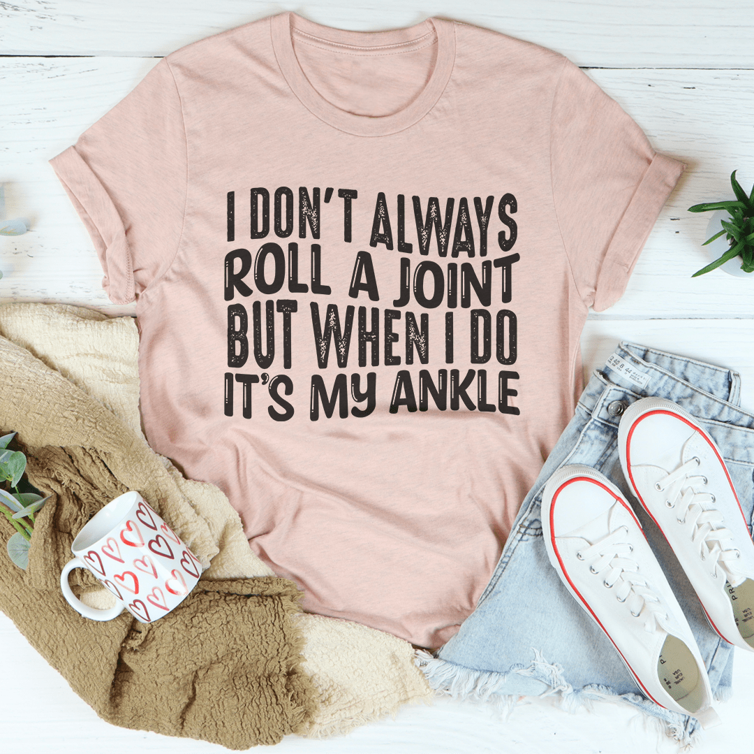 Mauve graphic crewneck t-shirt with 'ROLL A JOINT' slogan print.