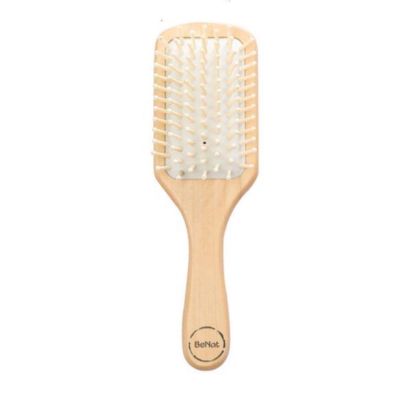 Natural wooden detangling hair brush with white cushioned bristle pad