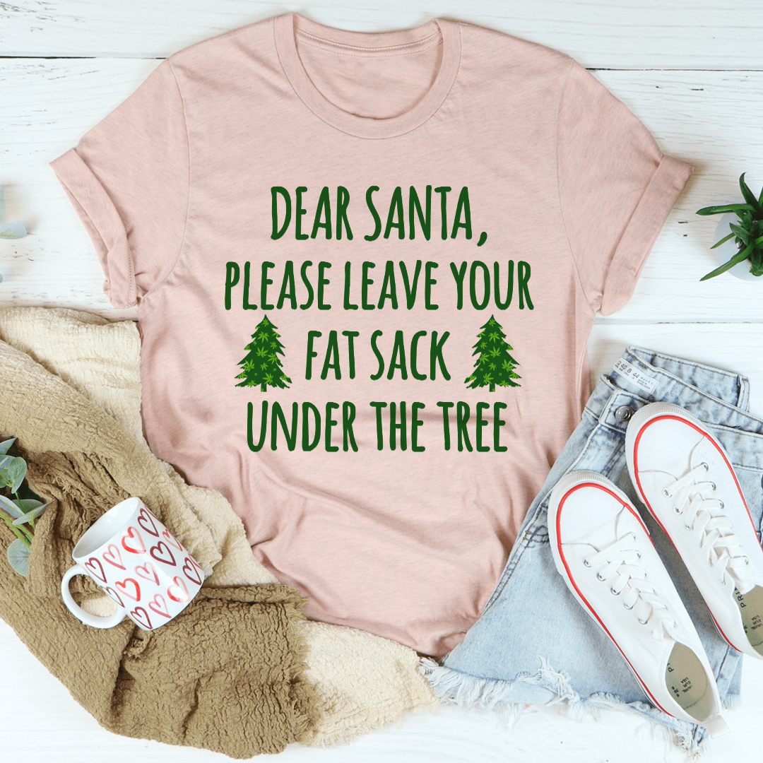 Peach graphic T-shirt with green 'Dear Santa' text and tree icons