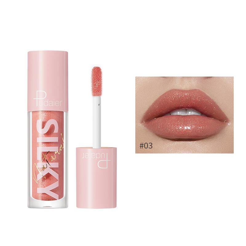 Lip luminizer gloss in pink shade #03, with applicator wand and lip swatch