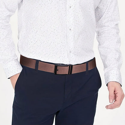 Brown nylon belt with black square buckle worn with dark pants