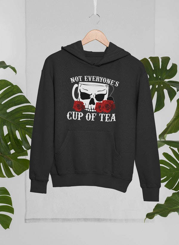 Black graphic hoodie with “Cup of Tea” skull and sunglasses print, front kangaroo pocket.