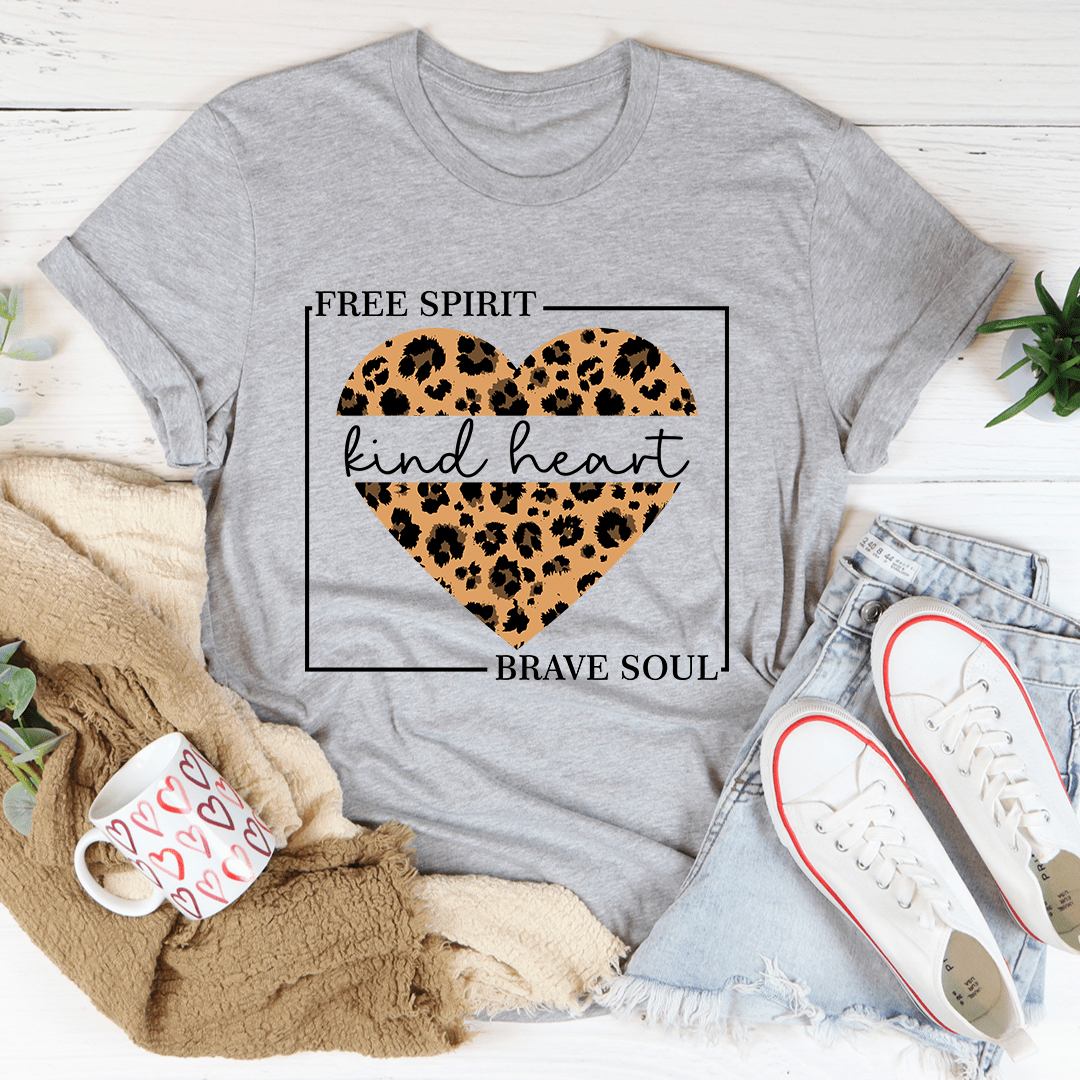 Gray graphic T-shirt with leopard heart reading 'kind heart', 'FREE SPIRIT' and 'BRAVE SOUL'