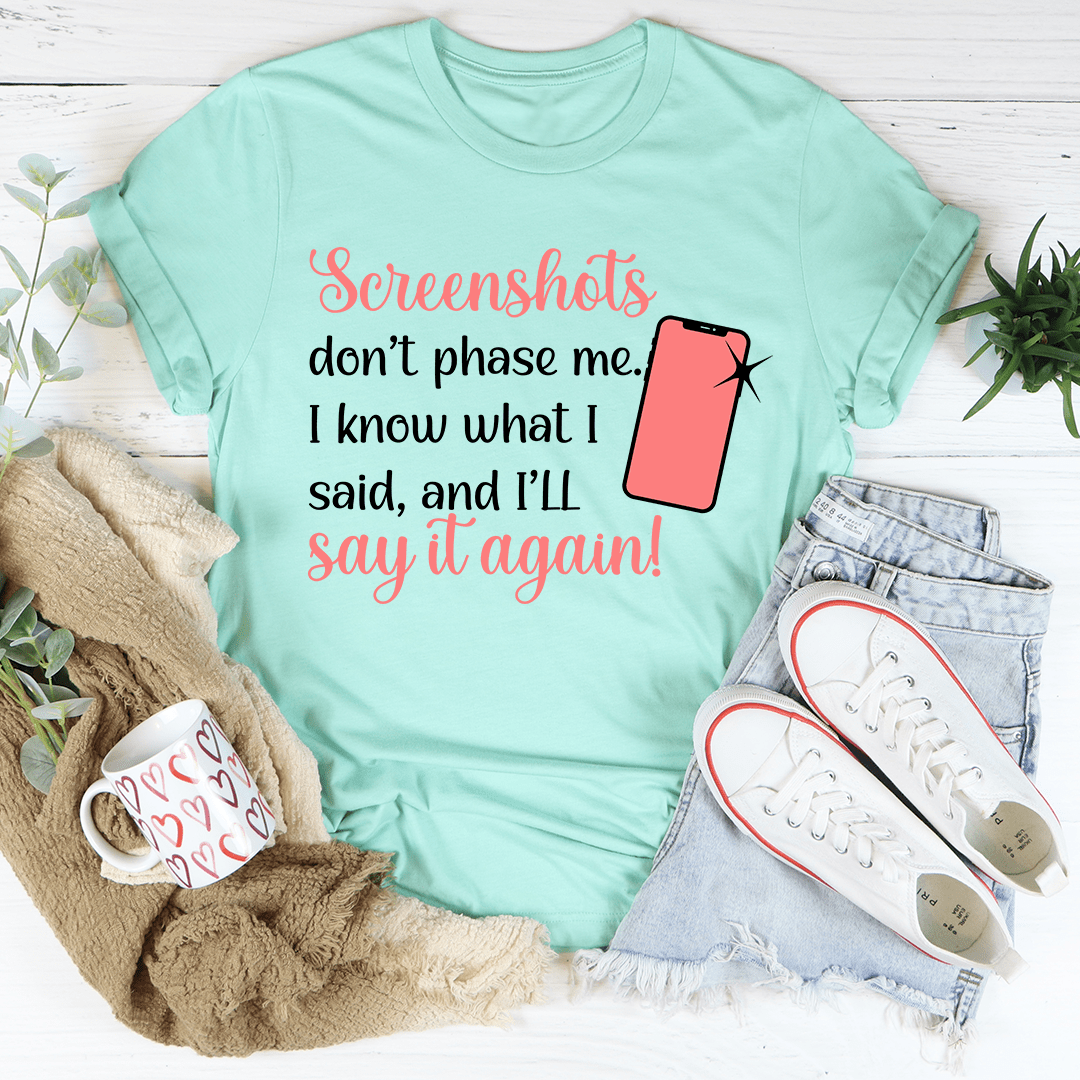 Mint green crew-neck graphic T-shirt: 'Screenshots don't phase me' phone icon