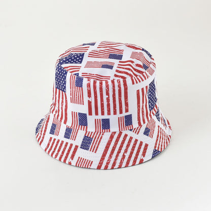 Bucket hat with red, white, and blue patchwork print and wide brim