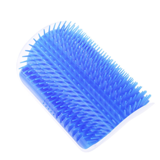 Blue corner grooming brush with spiked bristles on a white mounting base.
