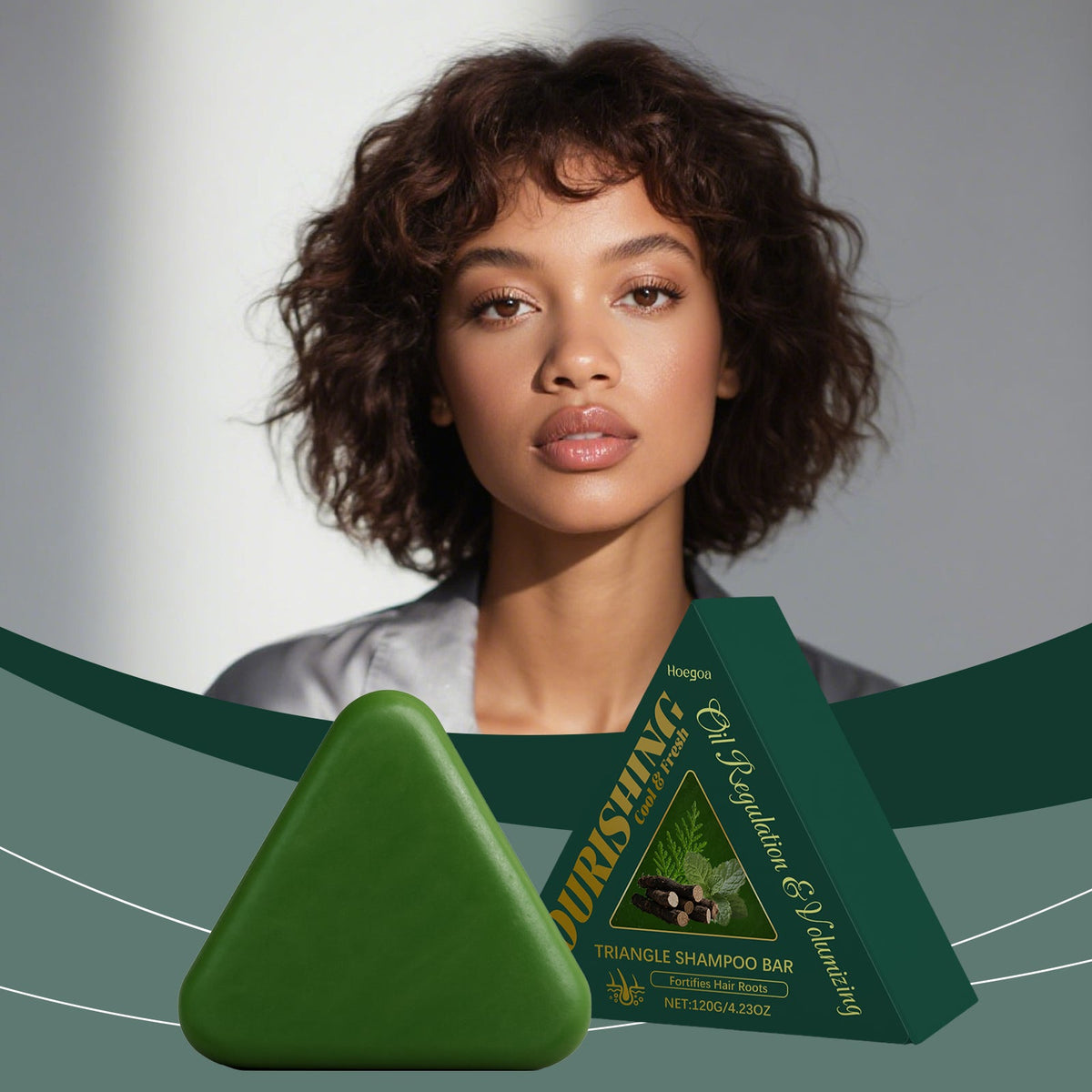 Green triangle shampoo bar with herbal label, angled view