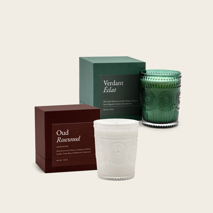 Scented candle set with white and dark green glass jars and “Oud Rosewood” box