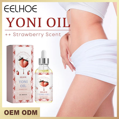 Intimate soothing essential oil bottle with dropper and box beside shorts-clad legs