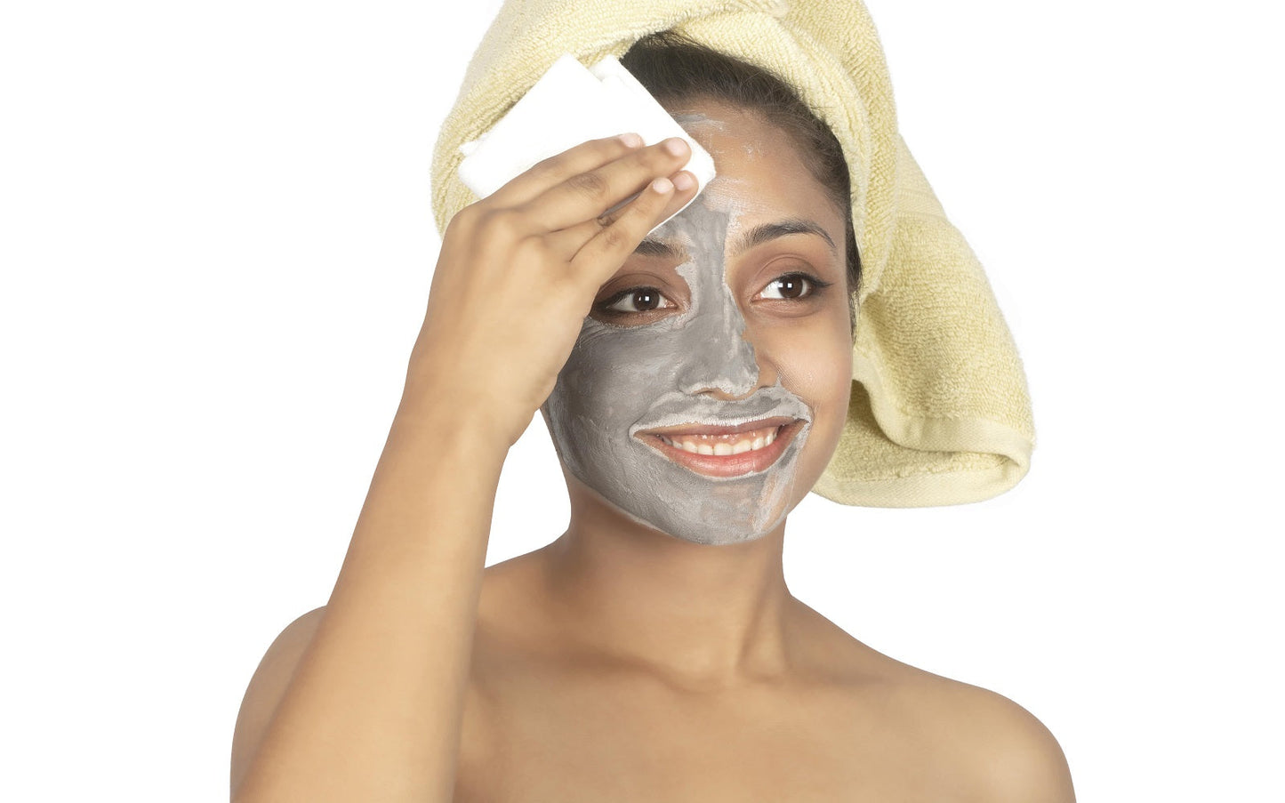 Muslin face cloth on forehead, white towel held to the face