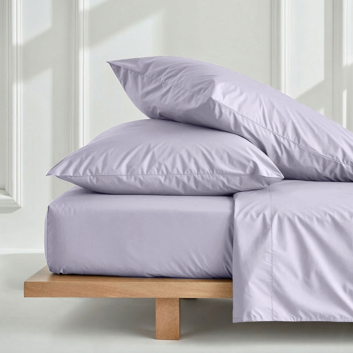 Lilac sateen pillowcase set with pillows and matching bedding set