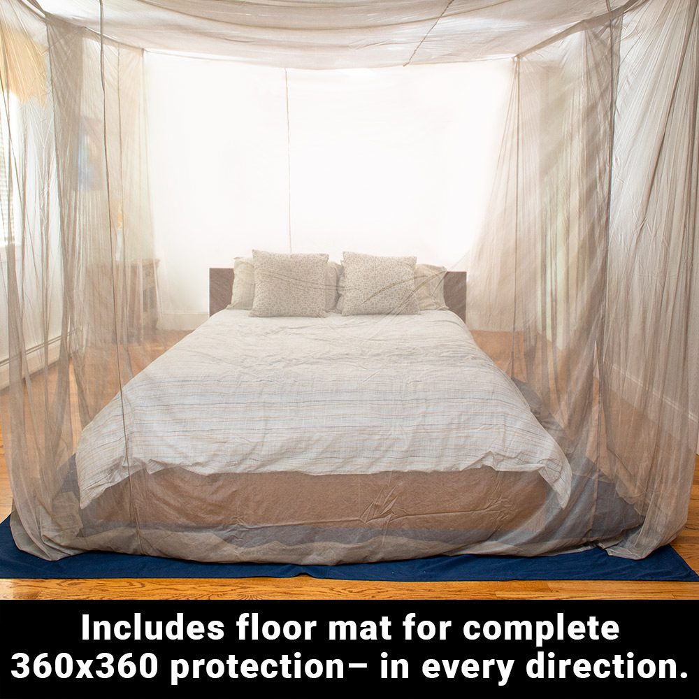 EMF shielding bed canopy draped over a bed with mesh walls and floor mat