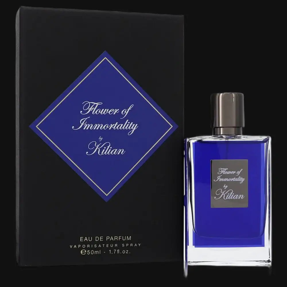 Women's eau de parfum bottle with blue glass and silver cap, shown with outer box