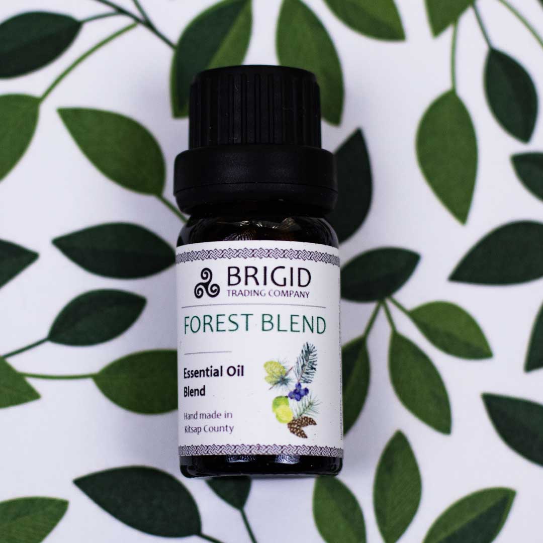 Essential oil blend bottle, Forest Blend label with black cap and white front tag
