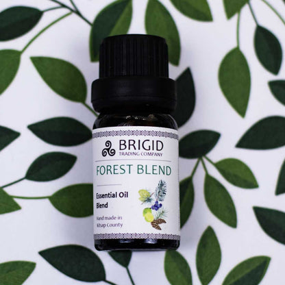 Essential oil blend bottle, Forest Blend label with black cap and white front tag