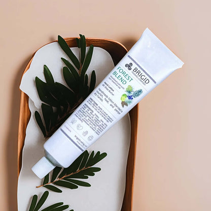 Brigid Forest Blend hand lotion tube on a white folded towel