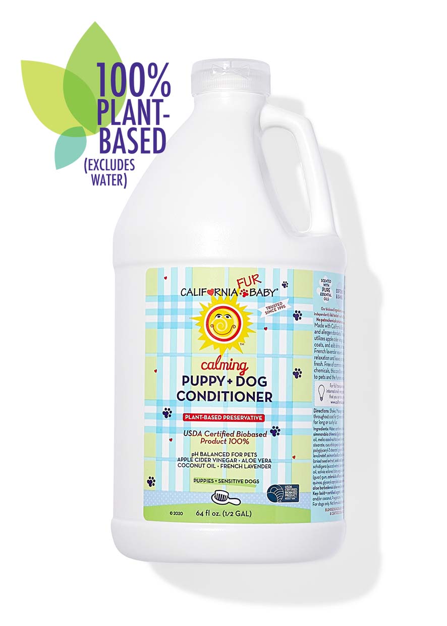 Calming™ Puppy + Dog Conditioner bottle with handle and front label