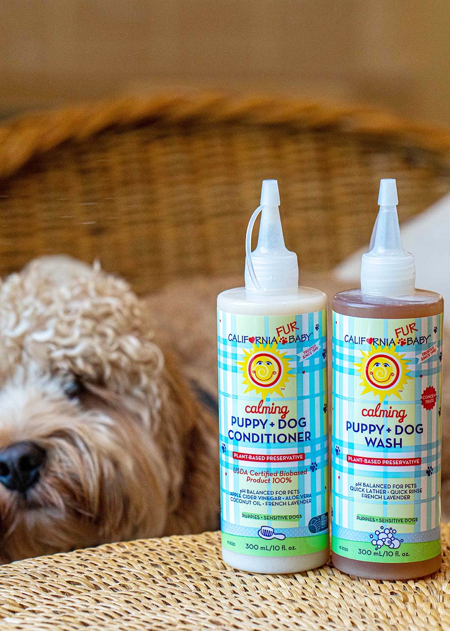 Calming puppy and dog conditioner and wash bottles with flip-top caps