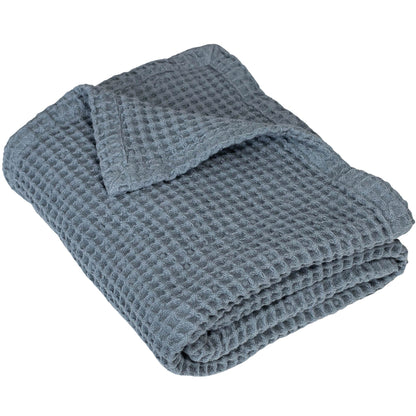 Waffle baby blanket in slate gray, folded with visible waffle-knit pattern