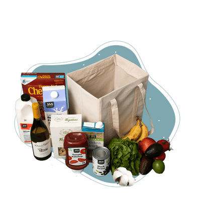 Light beige collapsible grocery shopping bag filled with groceries and foldable side handles