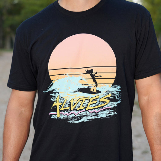 Black cowboy surfer T-shirt with large circular beach graphic and surfer silhouette.