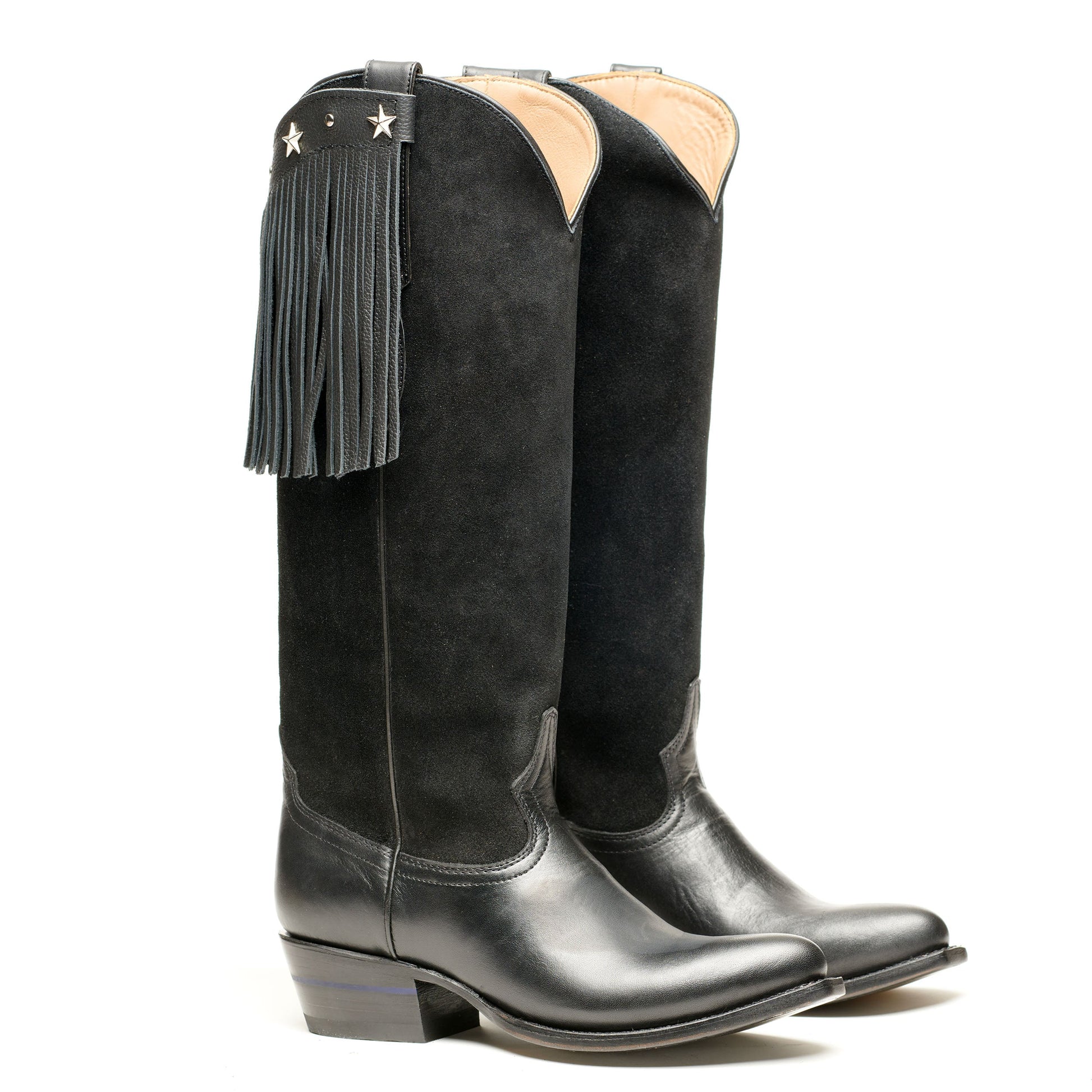 Black cowboy boots with long fringe and star emblem on shaft