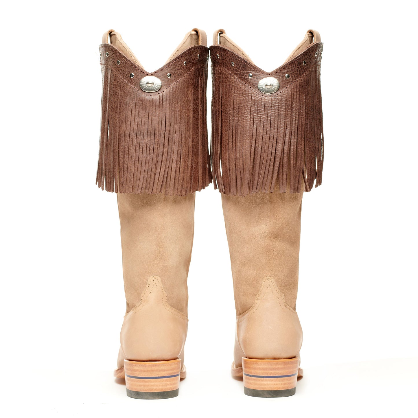 Pair of tan-and-brown fringe cowboy boots from the back, stacked heel
